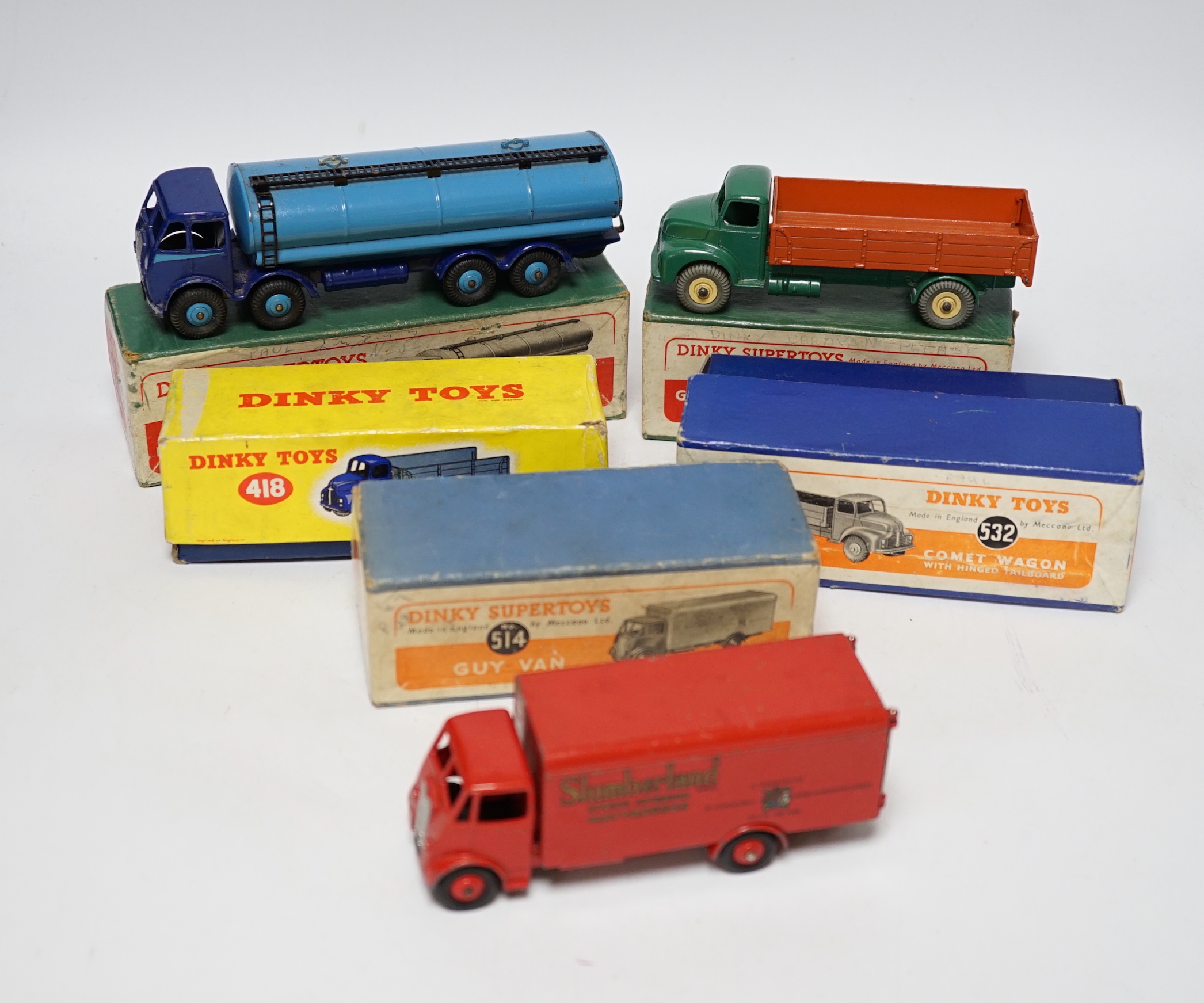 Three boxed Dinky Supertoys; (514) a Guy Slumberland Van, (504) a Foden 14 ton Tanker, and a (532) Comet Wagon with hinged tailboard, together with two useful empty boxes for a second Comet Wagon (418) and a Guy 4 ton Lo